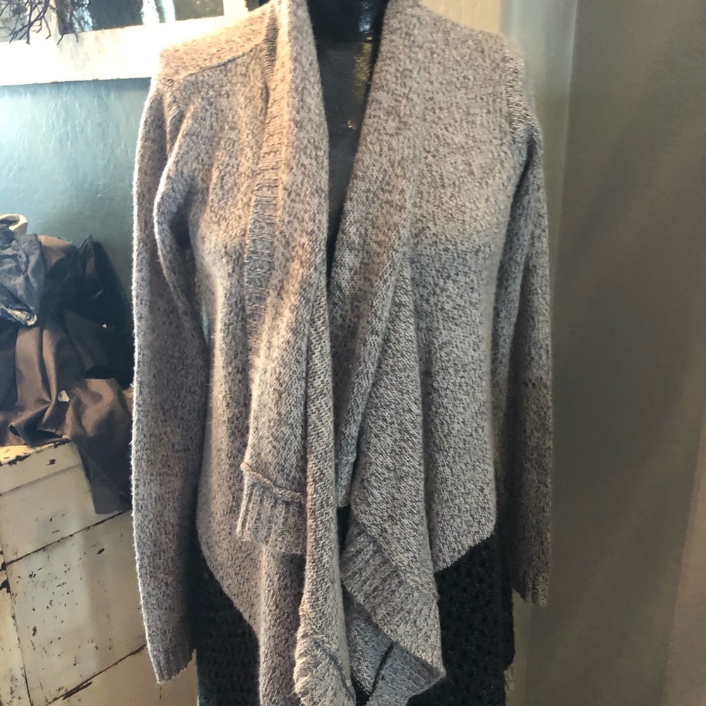 Grey and black sweaters